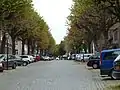 View of a historical street, the Diepstraat, that (downwards) leads to the river bank