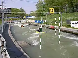 The course fully watered.  Corkscrew wave in the mid distance (past gate 15).