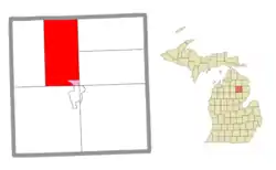 Location within Oscoda County (red) and an administered portion of the Mio community (pink)