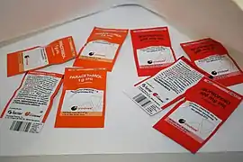 Pharmaceutical packets with text and bar code identification