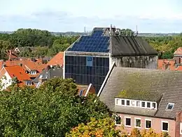 Old bunker cladded with solar