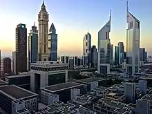 Image 6A view of the Emirates Towers in Dubai. The towers are the tallest two buildings on the right.