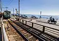 Railway crossing with Route 134 and Sagami Bay on the right, January 2019