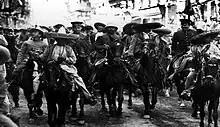 Zapata and Villa with their joint forces enter Xochimilco in December 1914.