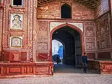 Entry to the mausoleum is through the Akbari sarai.