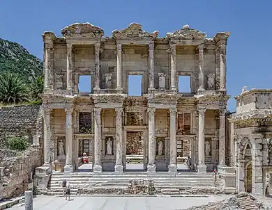 Stone facade, with columns and statues