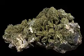 Image 6Epidote often has a distinctive pistachio-green colour. (from Mineral)