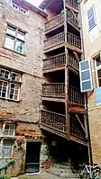 Hôtel d'Astorg: suspended wooden staircase in the courtyard.