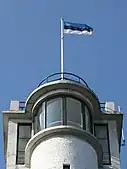 Flag of Estonia on top of Suur Munamagi watch tower, the highest point in Estonia, at 318m above sea level.