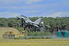 A No. 6 Squadron Eurofighter Typhoon T.3 taking off from Leuchars in 2013.