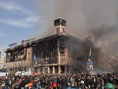 Image 7Burning of the Trade Unions BuildingPhotograph: AmakuhaThe burning of the Trade Unions Building—used as the headquarters of the Euromaidan movement—during the 2014 Ukrainian revolution, following a failed attempt by the Ukrainian police to capture the building. After the fire, the damaged building was covered with large canvas screens on two sides with the words "Glory to Ukraine" printed on them in large letters.More selected pictures