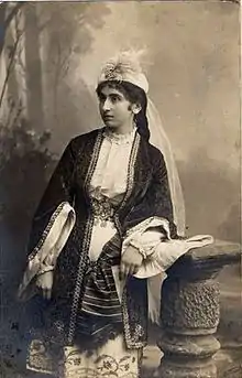 Old photo of a standing woman