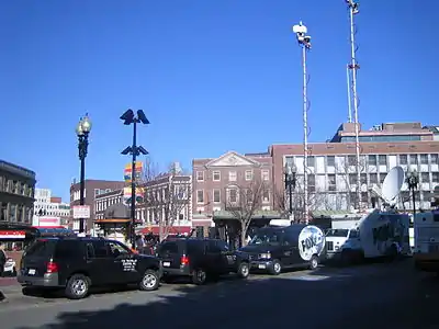 WFXT's trucks in Boston's Harvard Square