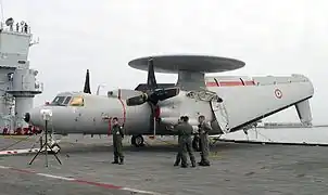 Grumman E-2 Hawkeye, which still uses a form of Grumman's Sto-Wing design.