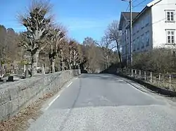 View of the road past the village cemetery