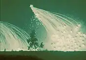  Night time air burst of white phosphorus as seen through night vision optics.