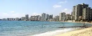 Image 48Varosha (Maraş), a suburb of Famagusta, was abandoned when its inhabitants fled in 1974 and remains under Turkish military control. (from Cyprus)