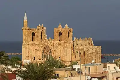 Image 43Cathedral of Saint Nicholas, consecrated in 1328, the largest medieval building in Famagusta, where the Kings of Cyprus were crowned also as Kings of Jerusalem. In 1571 having fallen to the Ottoman Empire it became the Mosque of Mağusa, and remains a mosque today (from History of Cyprus)