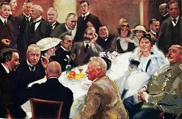 On the right at Akseli Gallen-Kallela's 50th birthday party, painting by Antti Favén [fi], 1915