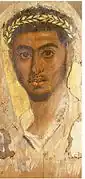 Fayum mummy portrait with the rhombus-shaped leaves representing laurel