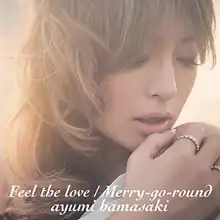 A close-up portrait of Hamasaki, with the title and artist name superimposed on her.