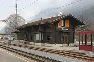 Two-story building with gabled roof