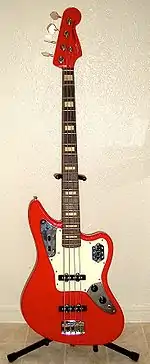 The front view of a 2007 Hot Rod Red Jaguar Bass