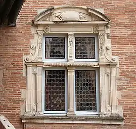 Merchant's office window on the courtyard.