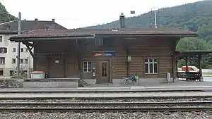 Two-story building with gabled roof