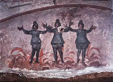 Wall painting from the early Christian Catacomb of Priscilla in Rome, 3rd/4th century AD, showing three figures in a fire above whom flies a dove with a branch in its beak