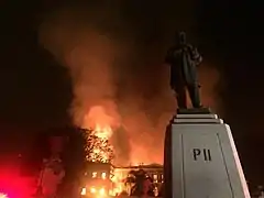 The palace in flames during the night of 2 September 2018, leaving it in ruin