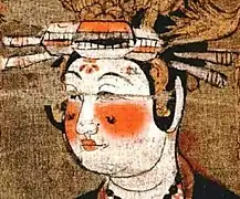 Woman wearing huadian on forehead and mianye, Five dynasties period.