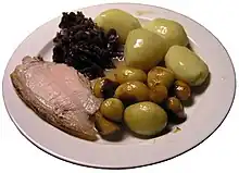 Served with two kinds of potatoes and red cabbage