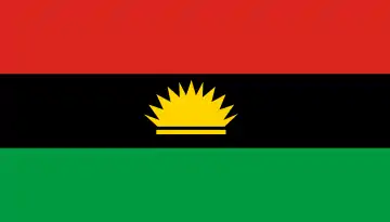 The flag of Biafra, a charged horizontal triband.