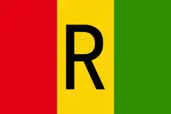 a tricolor flag with vertical bands for red, yellow and green. There is a black R on the yellow band.