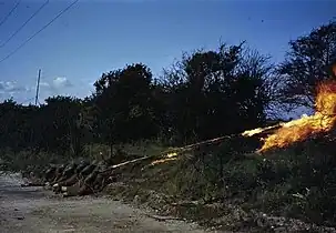 A Life Buoy flamethrower in action. August 1944.