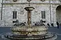 One of the two fountains in the piazza