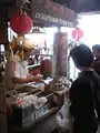 A stall selling kueh tutu (VivoCity outlet).