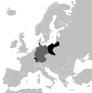 Eupen-Malmedy area and other German territories lost in both World Wars are shown in black, present-day Germany is marked dark grey on this 1914 map.