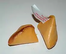 An opened fortune cookie