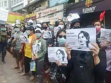 Image 15Protesters in Yangon carrying signs reading "Free Daw Aung San Suu Kyi" on 8 February 2021. (from History of Myanmar)