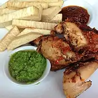 Fried yam with spicy chicken and kpakpo shito (ground green peppers)