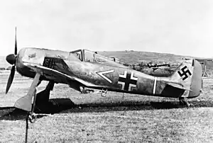 black and white photo of a WWII plane