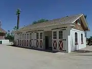 1905 Wagon and auto garage.