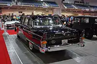 Rear view. Notice the tailpipe integrated in the rear bumper as well as the late-1950s American-style tailfins.