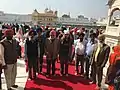 Paying homage at Golden Temple, India: Holiest Shrine of Sikhs.