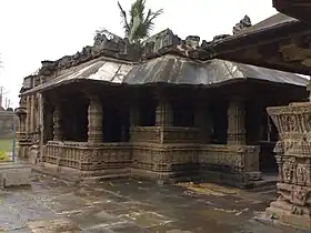 Brown, one-story temple porch with pillars