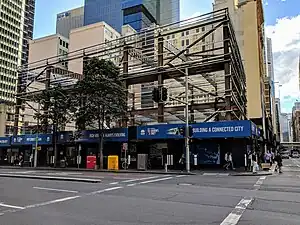 Picture of Gadigal station under construction from the street level.