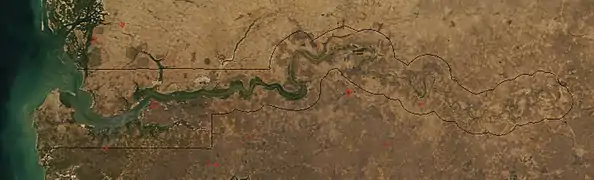 The western portion of the Gambia River, seen from space. The line shows the border of The Gambia.