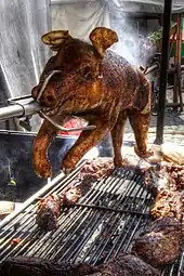 Spanferkel, a spit-roasted suckling pig in German cuisine